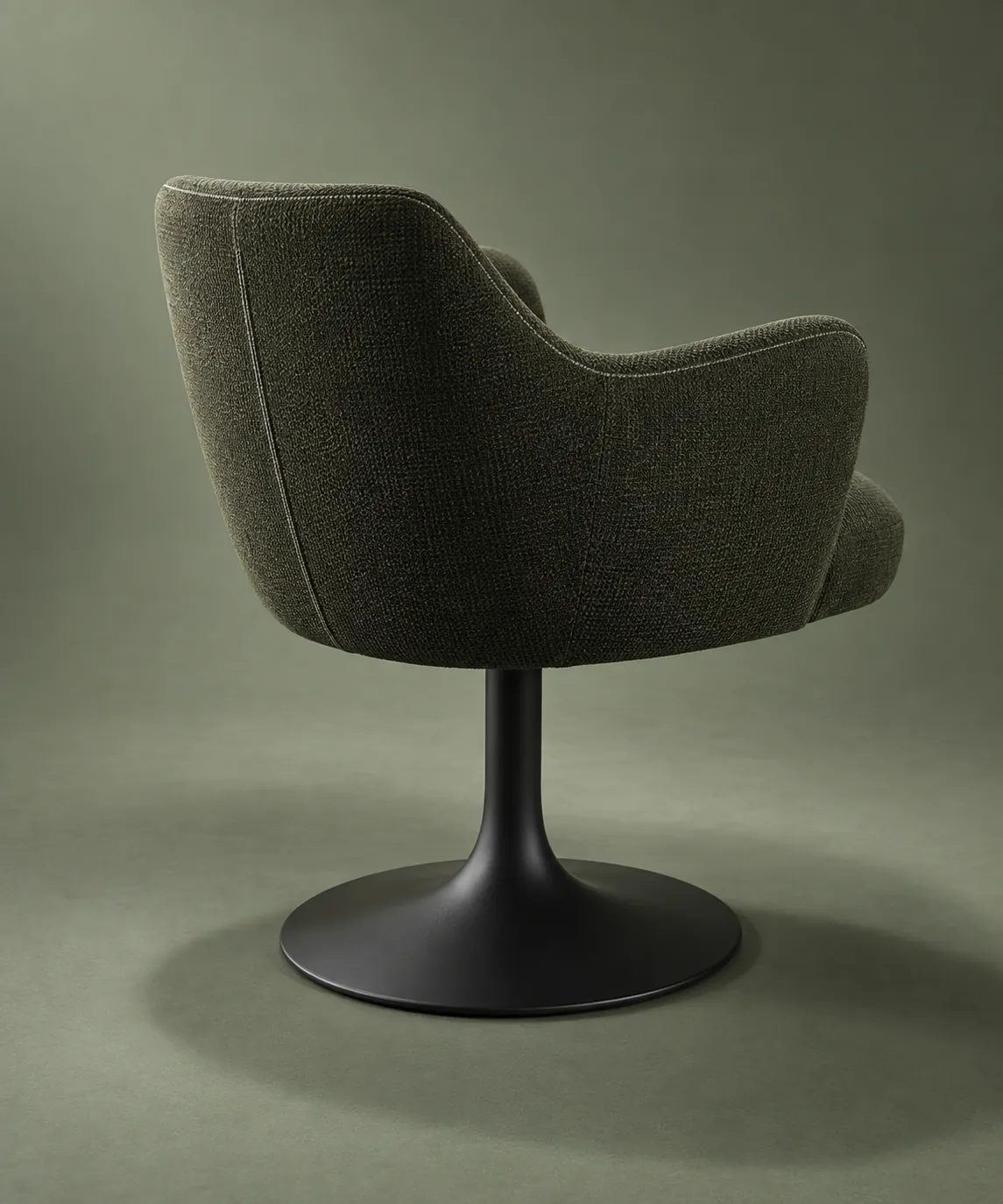 Illustrative olive swivel dining chair viewed from behind to show its arms and base