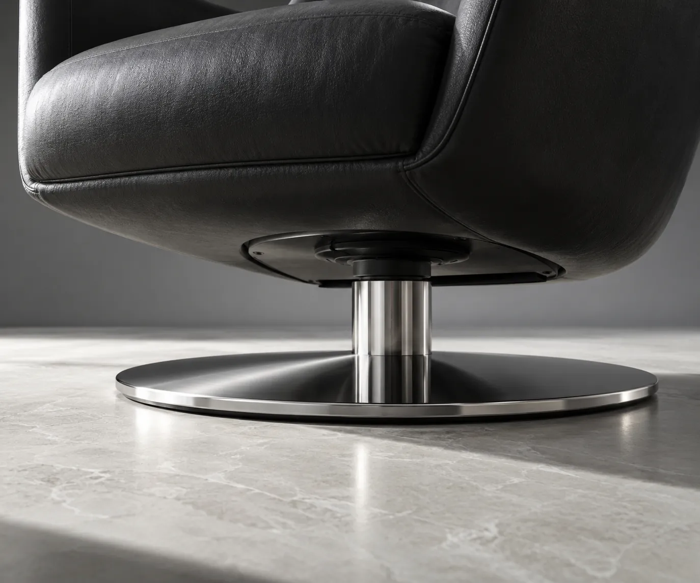 Close-up illustration of a chair pedestal and circular chrome base